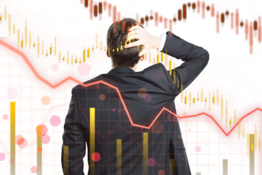 Businessman facing away, analyzing stock market graphs with declining trends on a white background. Concept of financial crisis, business decision making