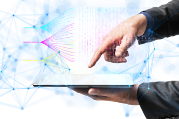 Businessman's hand interacting with a digital tablet, displaying flowing binary code and data visualization on a white background, concept of digital technology