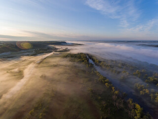 Misty Morning Over Countryside Fields