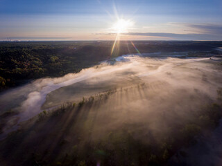 Misty Morning Over Countryside Fields