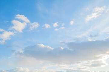 Blue sunset sky landscape with white dramatic clouds, sunset sky with clouds