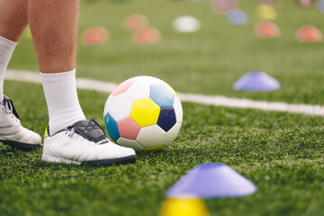 Obraz premium Colorful Soccer Ball. Sports Training for Children. School Kids Play Soccer. Physical Education Class for Elementary Age Children