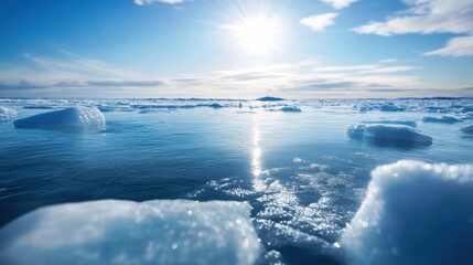 A stunning scene of icebergs floating in serene blue waters under a bright sun with reflective sunlight.