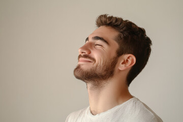 Fototapeta premium A close up of a man's face with his eyes closed