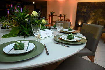 table set for a wedding reception, interior of a restaurant, room interior, table setting at restaurant, wedding table setting, table set for a dinner