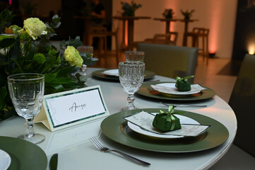 table set for a wedding reception, interior of a restaurant, room interior, table setting at restaurant, wedding table setting, table set for a dinner