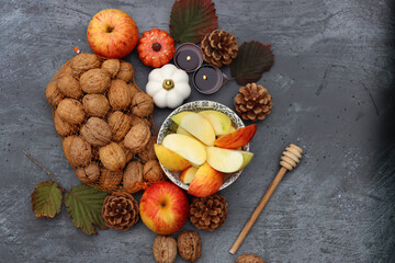 Apples and honey, Jewish new year's symbols top view photo. Rosh Hashana celebration concept. Still life with autumn fruit. 