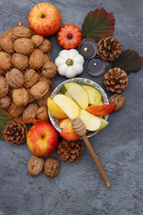 Apples and honey, Jewish new year's symbols top view photo. Rosh Hashana celebration concept. Still life with autumn fruit. 