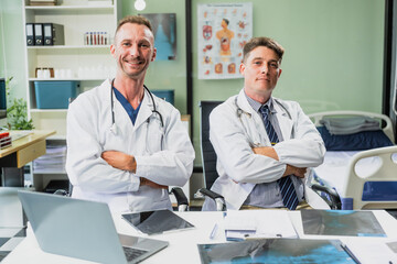 Caucasian middle-aged male doctor and Italian scientific researcher are seated at desk, discussing innovative antiviral drug inventions, with a monitor displaying the latest technology advancements.