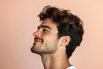 Obraz premium A close up of a man's face with his eyes closed