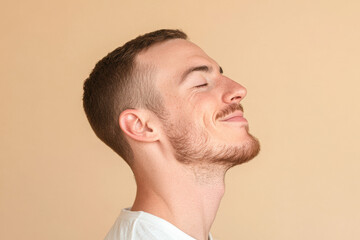 Obraz premium A close up of a man's face with his eyes closed