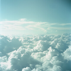 view from airplane window clouds above the sky