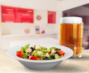 Caesar Salad with fresh vegetables and dressing.