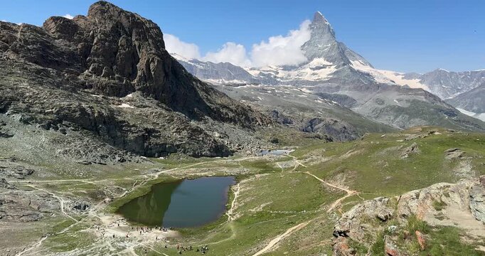 Riffelsee Lake and Matterhorn mountain in the Alps with reflection. Alpine scene in Switzerland