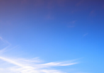 Fototapeta premium A pristine clear blue sky background, featuring a smooth gradient from light to deep blue, with minimal clouds blue sky background with tiny clouds, blue sky with tiny clouds