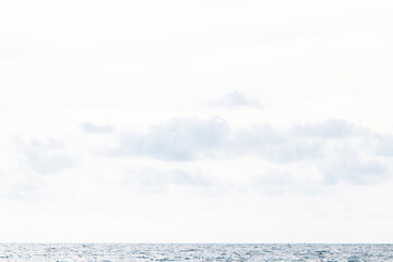 Morning of blue with cloud sea on horizon. Beautiful wave ocean wave on clean sandy beach. Sand surfing at Thailand. Waves sea crashing shore Abstract texture. Summer day and sandy background concept.