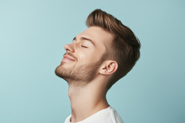 Obraz premium A close up of a man's face with his eyes closed