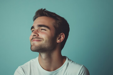 Obraz premium A close up of a man's face with his eyes closed