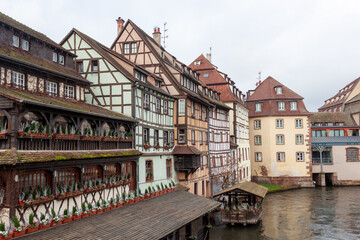 Bridges and old buildings on the embankment of the river Ile