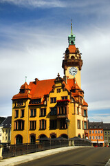Obraz premium Town hall of Waldheim, a small town in Saxony that lies in a valley of the deeply cut Zschopau river below the Kriebstein dam.