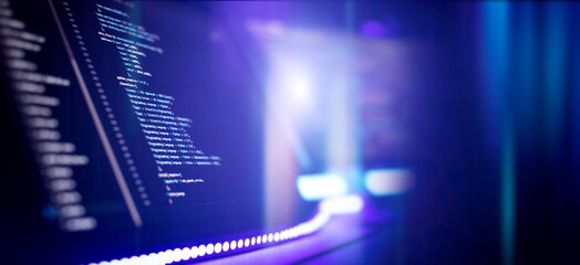 Program code on a computer monitor. Web development and programming concept. Programmer using...