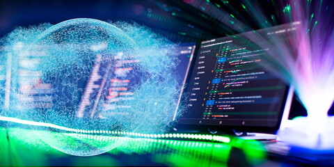 Computer monitor with abstract world map and binary code. Programming anywhere in the world