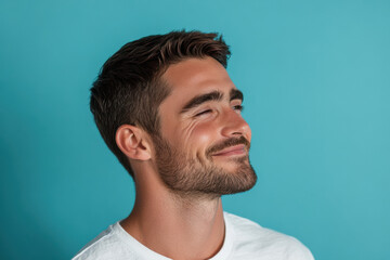 Obraz premium A close up of a man's face with his eyes closed