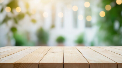 Empty wooden table with blurred green garden background