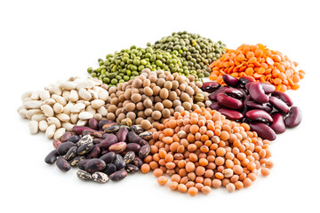 Colorful lentils and beans on white background