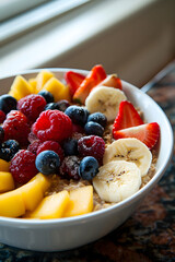 A Bowl Of Oatmeal Topped With Fresh Fruits