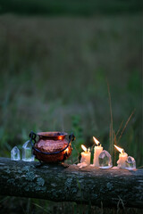 burning candles in the fireplace