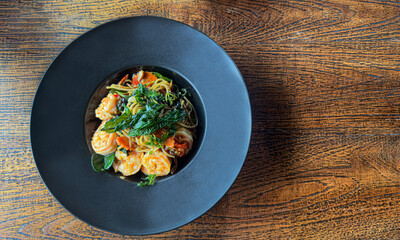 Spaghetti Pad Kee Mao with Shrimp, Thai-Italian Style with Thai herbs.