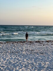 Kid walking on the beach
