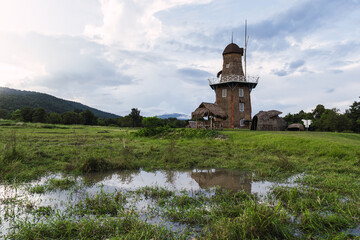 windmill on green meadow