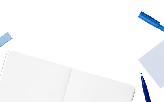 Overhead spread white notebook with blue pen, blue ballpoint pen and blue sticky note stationery cutout frame