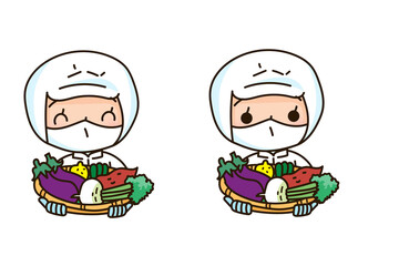 たくさんの野菜を持つ食品加工スタッフ