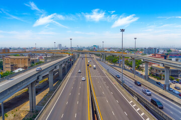 Overlooking the city from the highway interchange view into the distance into perspective