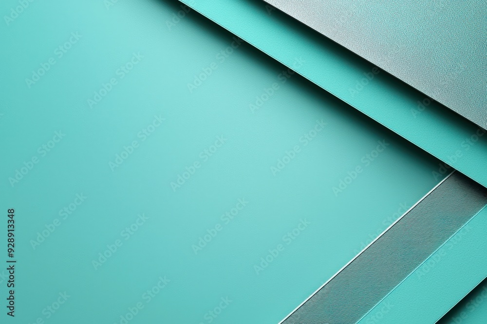 Poster Textured sheets of turquoise paper overlap on a flat surface, creating a visually appealing design for art or craft projects