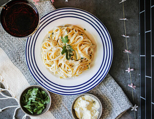 Eating a good quality Alfredo with real ingredients. Eating this dish in moderation is good for a healthy self-care practice.