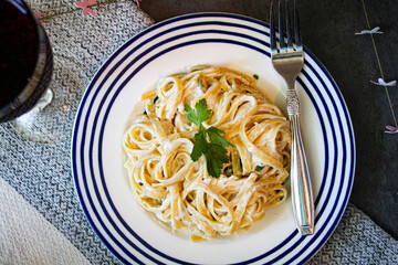 Eating a good quality Alfredo with real ingredients. Eating this dish in moderation is good for a healthy self-care practice.