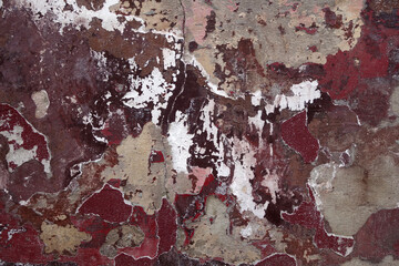 Grungy cracked cement wall texture.