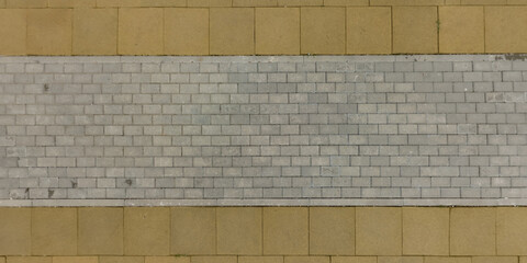 top view of surface of paving slabs and pedestrian footpath