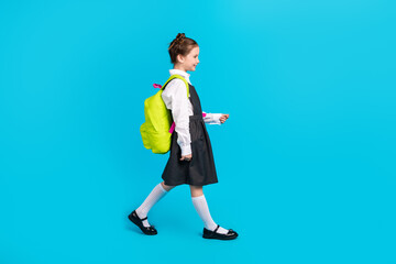 Full body photo of cute little girl backpack shopping profile walking dressed stylish school...
