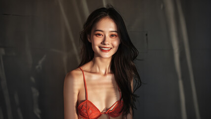 A consistent red wardrobe and gentle lighting shifts enhance the model&rsquo;s expressive range, from inviting smiles to focused gazes, capturing her dynamic beauty.