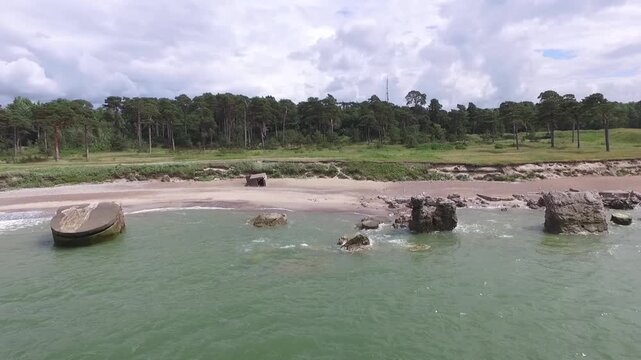 Ruins of an old abandoned military fort, bunkers on the Baltic Sea beach in Karosta Liepaja, Latvia. Part of an old fort in the former Soviet base.