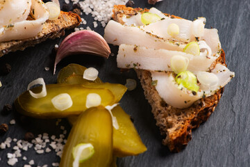 Obraz premium Tasty sandwich with salted lard (salo). Tasty sandwich with salted pork lard (salo),traditional Ukrainian cuisine