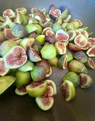 Fresh cut figs. A pile of delicious organic figs. Healthy vegan food.