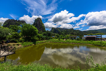 Fototapeta premium Wallpaper from the top of the mountain, overlooking the panorama, with the wind blowing all the time, fresh air, is a viewpoint that adventurers regularly visit.