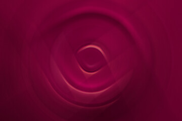 A view of a maroon colored spinning vortex.