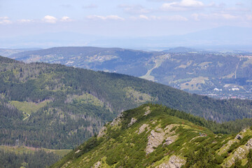 Obraz premium natural view from the top of the mountain to the city in the valley